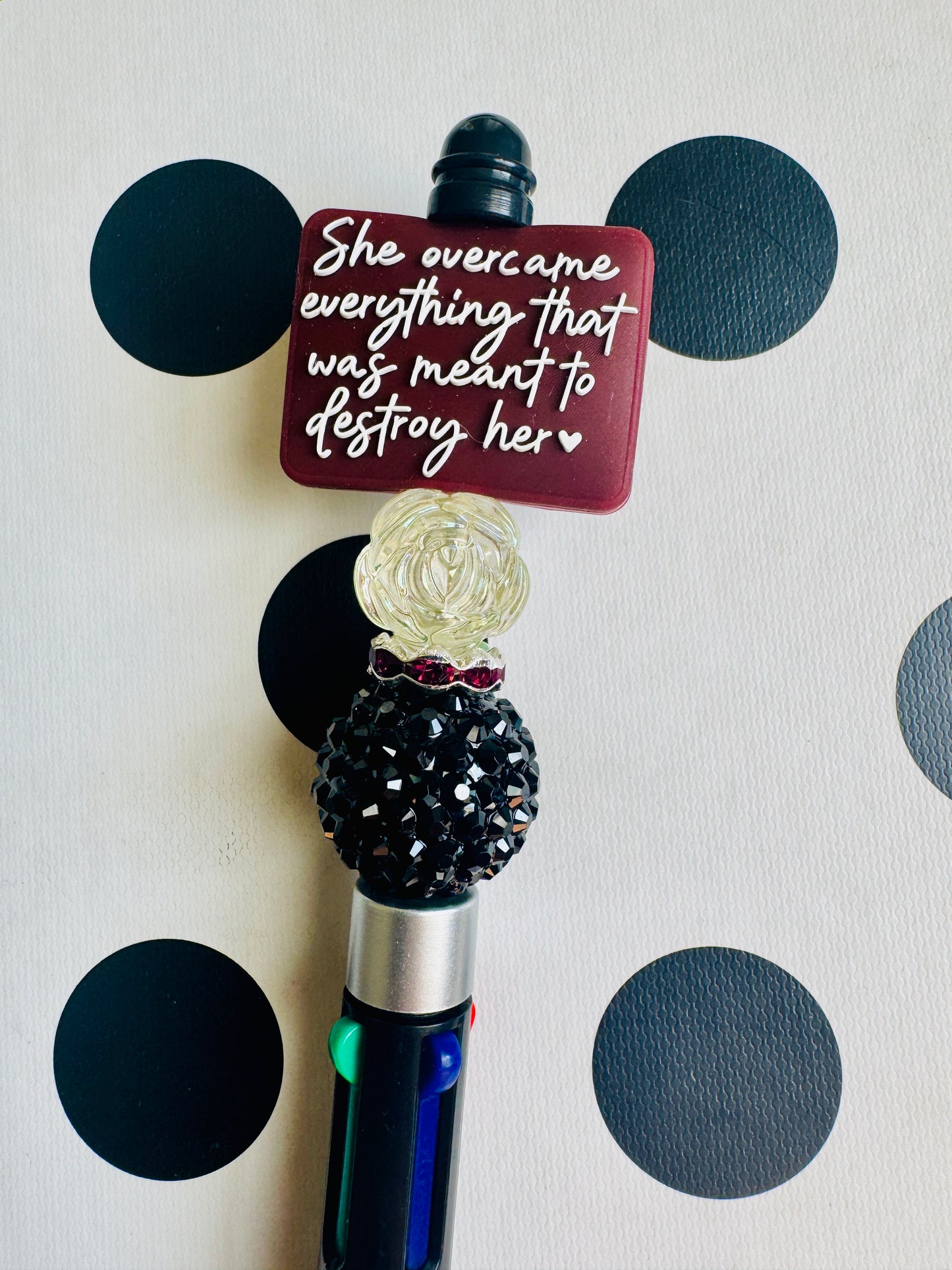 She overcame beaded pen